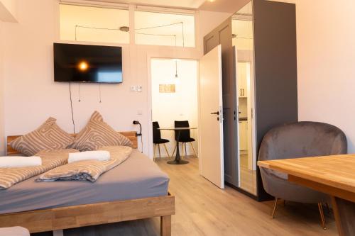 Foto New central 2-3 room apartments with parking near train station & casino 5