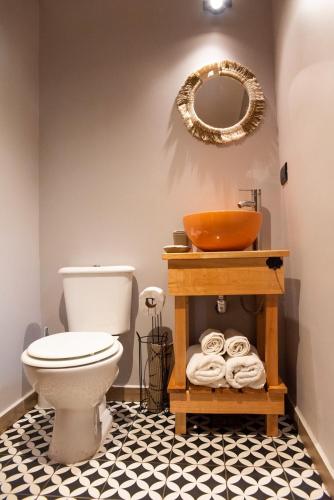 a bathroom with a sink and a toilet at Container Los Lobos in Chapadmalal