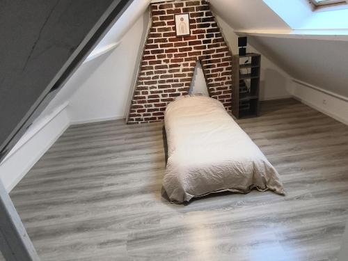 Postel nebo postele na pokoji v ubytování Charmante maison centre village