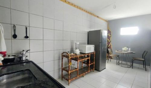 Kuchyň nebo kuchyňský kout v ubytování Praia de Carapibus PB - Casa pé na areia