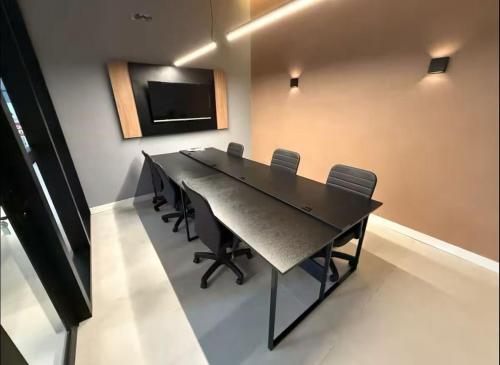 Møde- og/eller konferencelokalet på Lindo Loft Studio no Centro de Curitiba