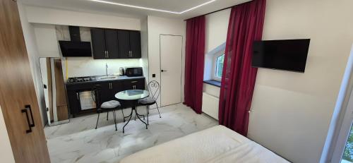 Køkken eller tekøkken på Afina center apartment