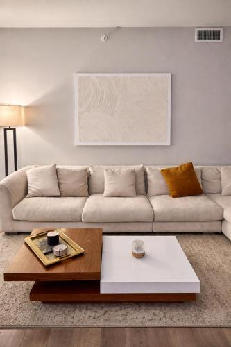 a living room with a couch and a coffee table at SuCasa in Arlington