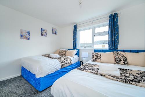 En eller flere senge i et værelse på H27 - Grandiose & Hospitable stay