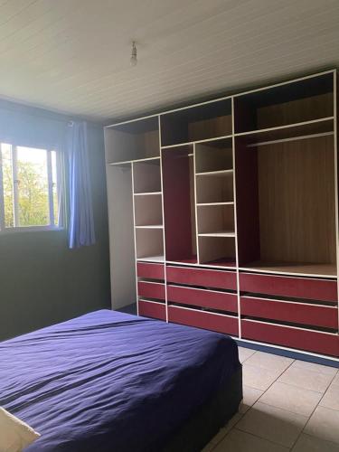 En eller flere senge i et værelse på Casa a 3km da PRAIA Central