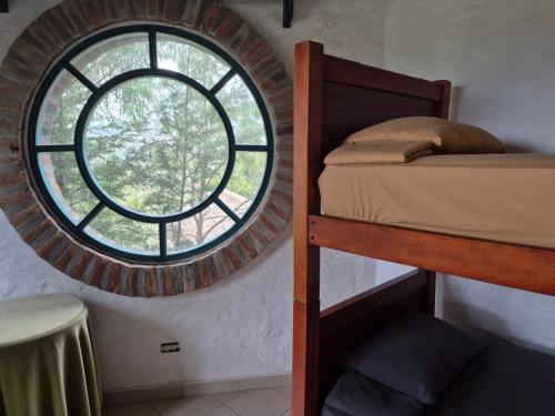 Postel nebo postele na pokoji v ubytování Teos Harmony Center