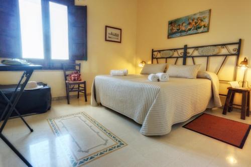Postel nebo postele na pokoji v ubytování Agriturismo Vultaggio