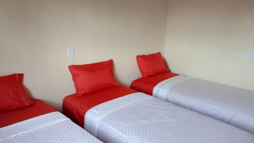 En eller flere senge i et værelse på Casa Mar