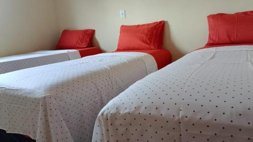 En eller flere senge i et værelse på Casa Mar