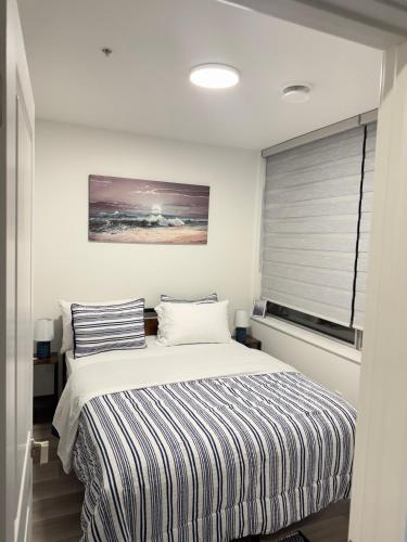 Postel nebo postele na pokoji v ubytování EP Stays