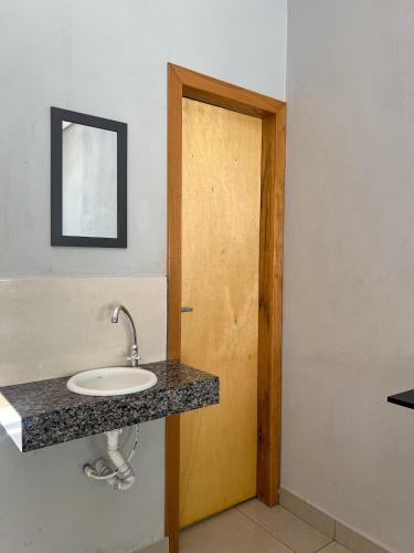 Et badeværelse på Fica Aki - Hospedagem Alta Floresta