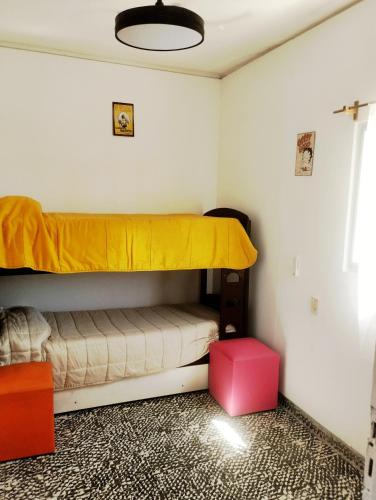 a bedroom with a bunk bed in a room at Vm casa in Villa María