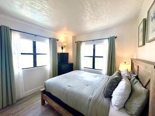 Postel nebo postele na pokoji v ubytování Cozy Getaway