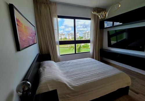 Postel nebo postele na pokoji v ubytování Oasis Turquesa Punta Cana Crystal Lagoon