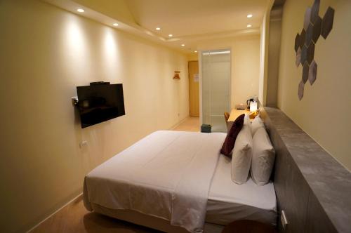 TV a/nebo společenská místnost v ubytování 向陽海 Sun&Sea INN