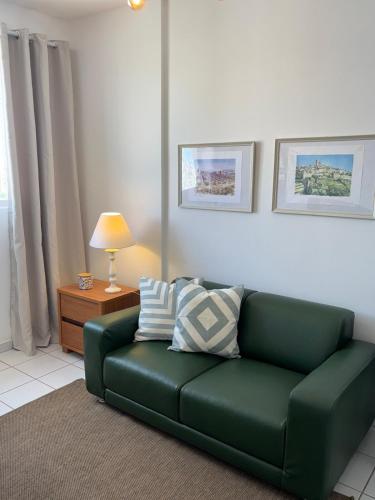 Posezení v ubytování Apartamento no centro com ar-condicionado