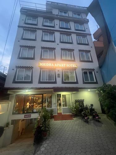 a building with a sign that reads hotel apache hotel at Boudha Apart Hotel in Kathmandu