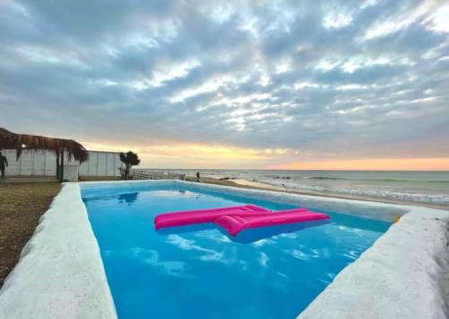 Swimmingpoolen hos eller tæt på Casa de playa San Marino Camana