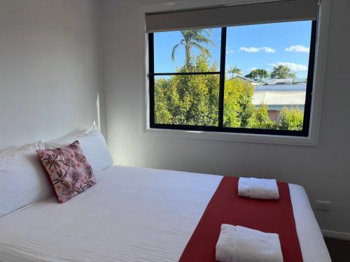 Postel nebo postele na pokoji v ubytování Fishing Haven Holiday Park