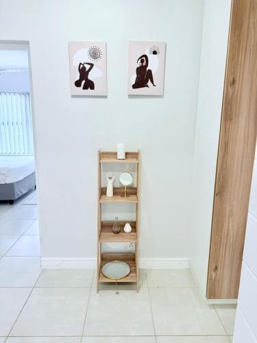 a shelf with a toilet in a room at Spacious 3 Bedroom Apartment in Ballito Hills Lifestyle Estate Near Ballito Beach in Ballito