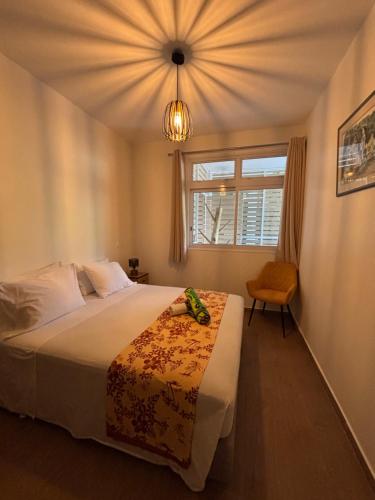 Un pat sau paturi într-o cameră la Ananahi plage