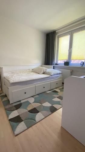 En eller flere senge i et værelse på Centrum u Magdy