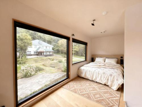 Postel nebo postele na pokoji v ubytování WildChild