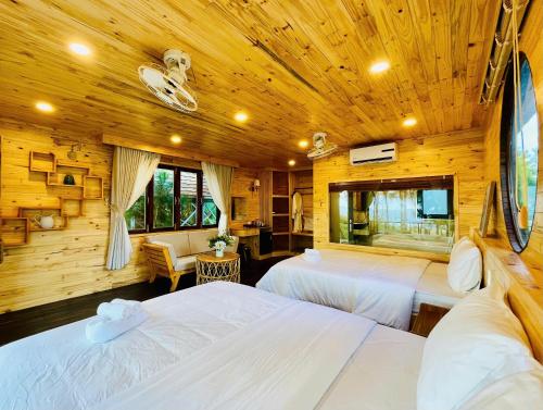 Et tv og/eller underholdning på The Lake Hill Farm Tà Đùng