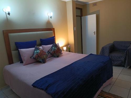 En eller flere senge i et værelse på The Glen House