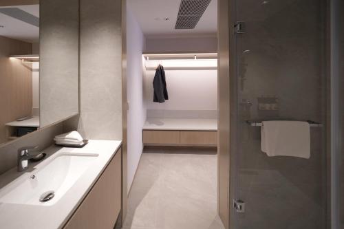 Et badeværelse på Stage Well Hotel