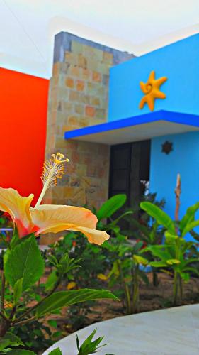 a house with a star on the top of it at Villa Star of the Sea in Barra de Navidad