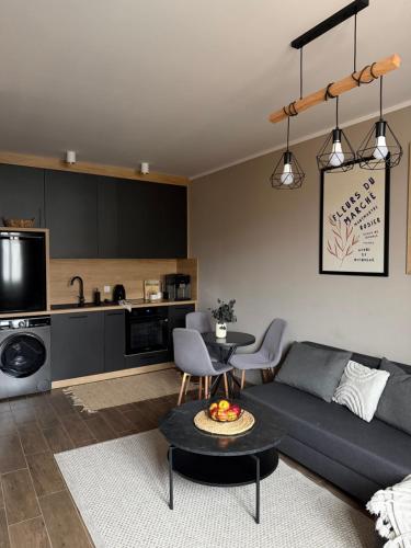 Køkken eller tekøkken på Apartament MOCHA Szczytno Mazury