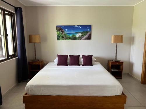 Postel nebo postele na pokoji v ubytování Villa Voilier