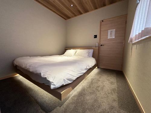 Кровать или кровати в номере Nakazaike