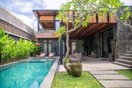 Swimmingpoolen hos eller tæt på 4 BR Retreat Villa - Beach Access