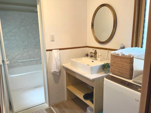 Et badeværelse på Cozy House Azumino