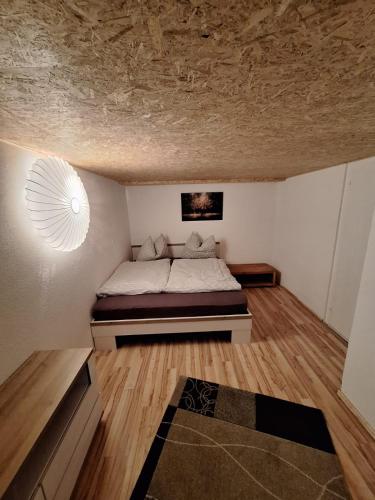 a bedroom with a bed in a room at Zoe's Ferienwohnung in Tulfes