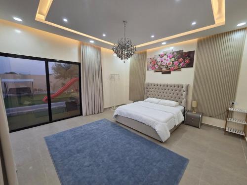 Giường trong phòng chung tại Sand Paradise