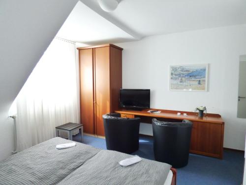 Hotel Alt Büttgenにあるベッド