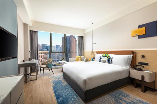 Postel nebo postele na pokoji v ubytování voco Chengdu High-Tech