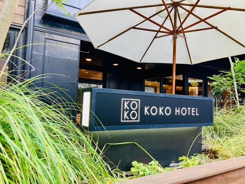 Et logo, certifikat, skilt eller en pris der bliver vist frem på KOKO HOTEL Korakuen - formerly Hotel Wing International Korakuen
