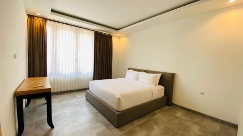 Postel nebo postele na pokoji v ubytování 2-bedroom minimalist villa in Sanur