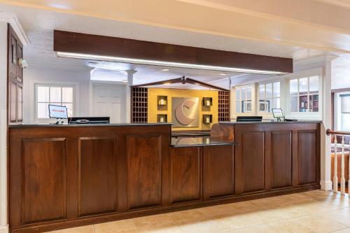 a kitchen with a large wooden counter top at Comfort Inn Rockland - Boston in Rockland