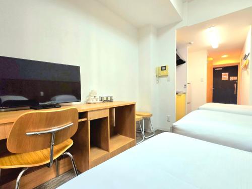 Et tv og/eller underholdning på 嵐 Arashi BNB 大国町 No8113