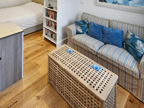 En eller flere senge i et værelse på Annexe