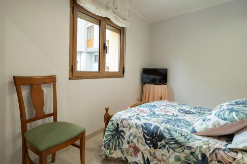 En eller flere senge i et værelse på Apartamento El Fondon 2