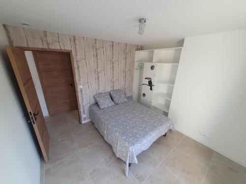 Postel nebo postele na pokoji v ubytování La Parenthèse