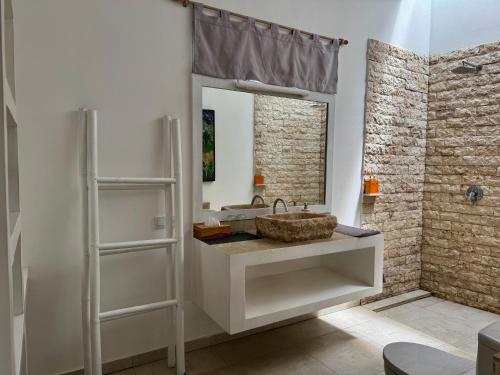 Et badeværelse på Cocotoa Boutique Hotel & Villa