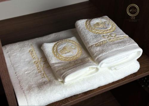 En eller flere senge i et værelse på Quan Qonaq Uii