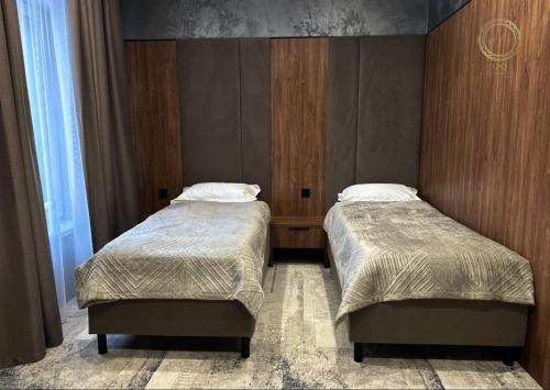 En eller flere senge i et værelse på Quan Qonaq Uii